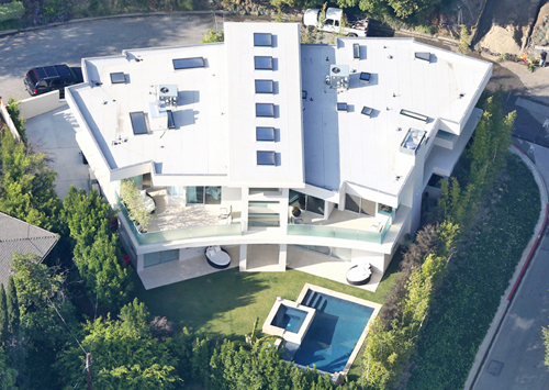 PREMIUM EXCLUSIVE Justin Bieber downsizes after post-Grammy mansion-wrecking party  Pt 2